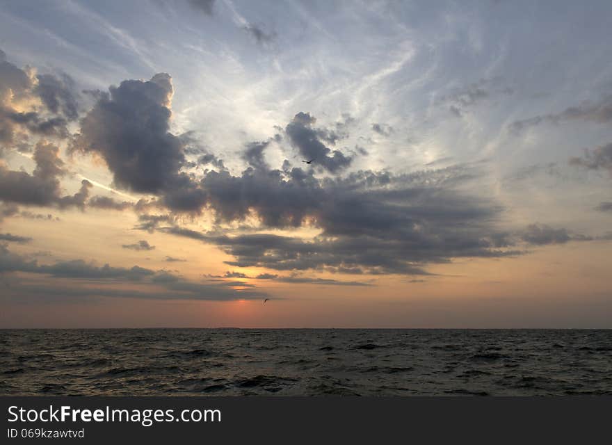 A sunset shot stiched from two shots. Clouds and light were beautiful. A sunset shot stiched from two shots. Clouds and light were beautiful.