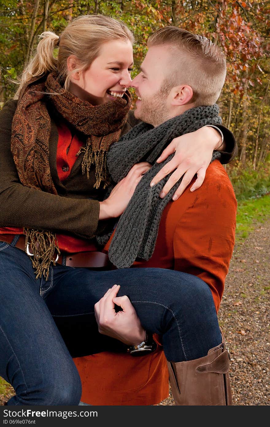 Happy young couple is having a nice time in october. Happy young couple is having a nice time in october