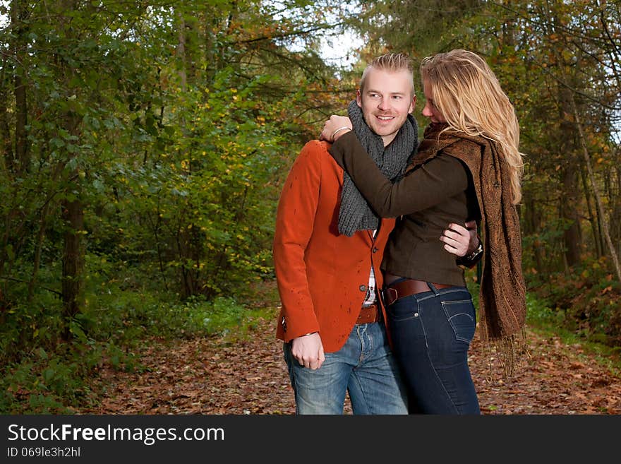 Happy young couple is having a nice time in october. Happy young couple is having a nice time in october