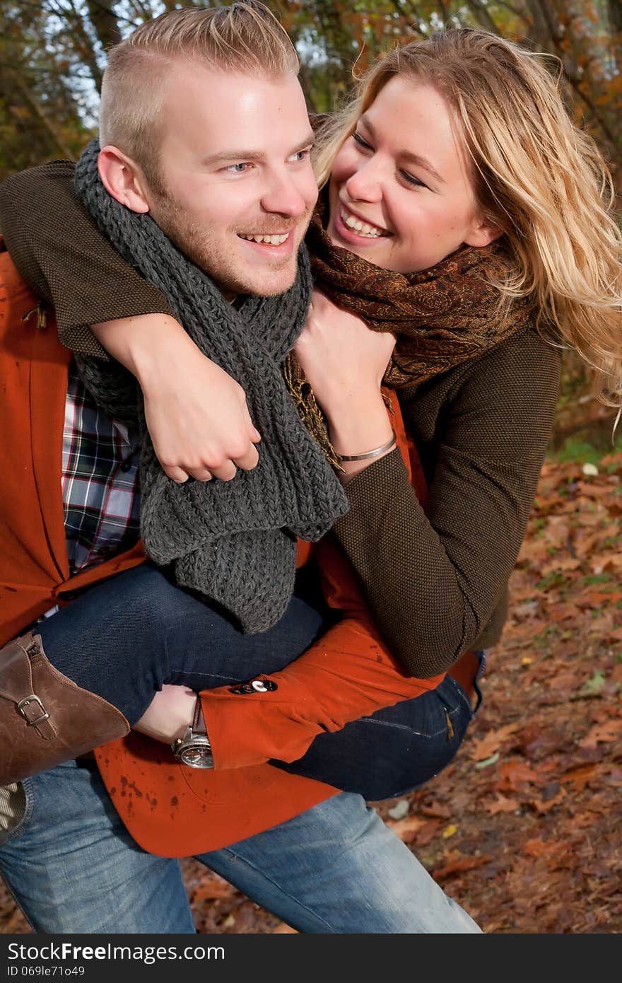 Happy young couple is having a nice time in october. Happy young couple is having a nice time in october