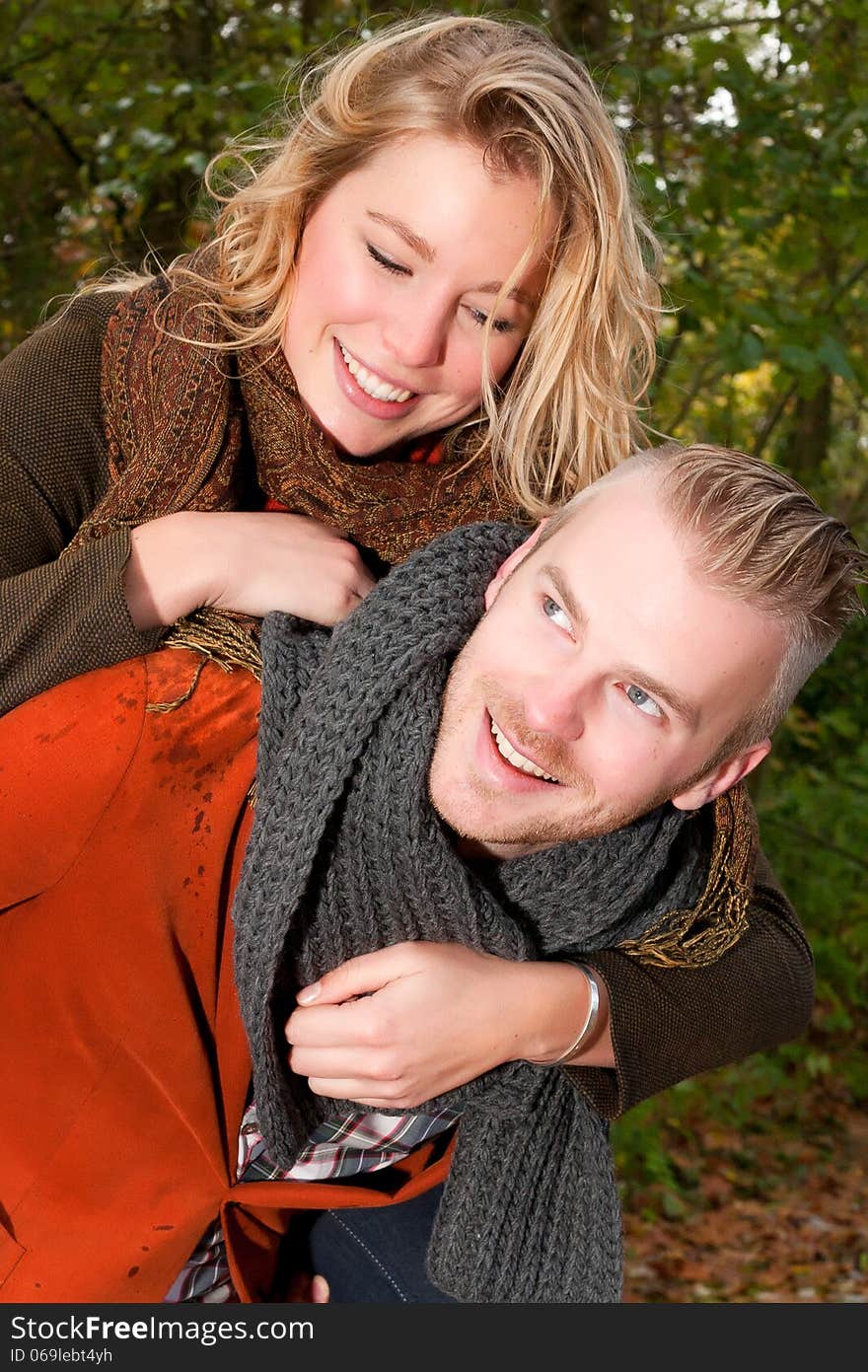 Happy young couple is having a nice time in october. Happy young couple is having a nice time in october