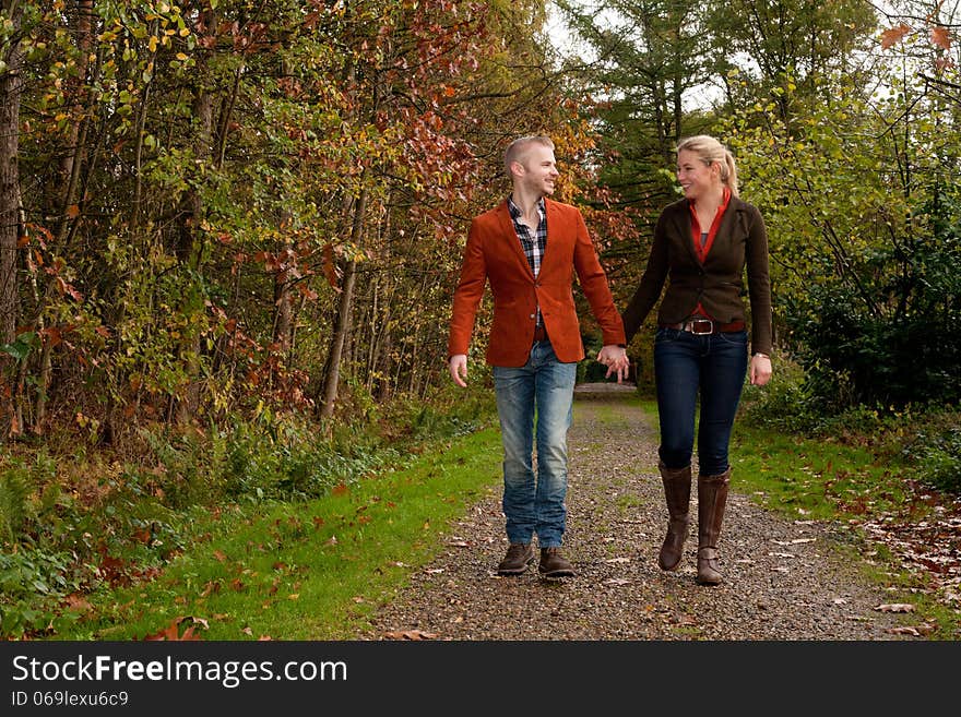 Happy young couple is having a nice time in october. Happy young couple is having a nice time in october