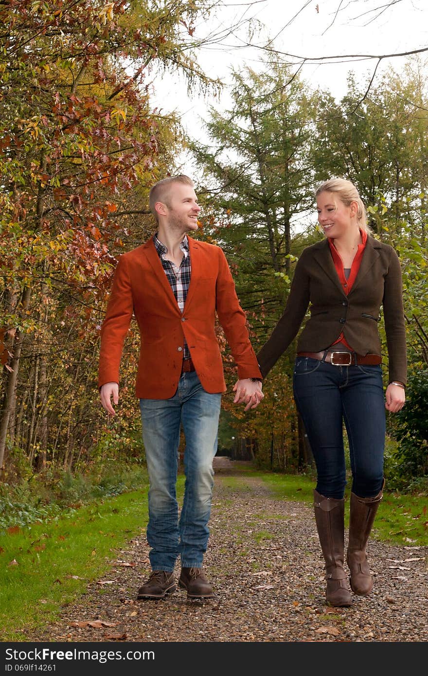 Happy young couple is having a nice time in october. Happy young couple is having a nice time in october