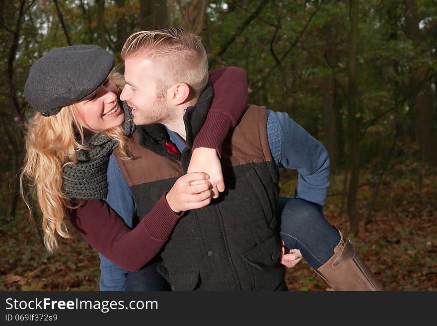 Happy young couple is having a nice time in october. Happy young couple is having a nice time in october