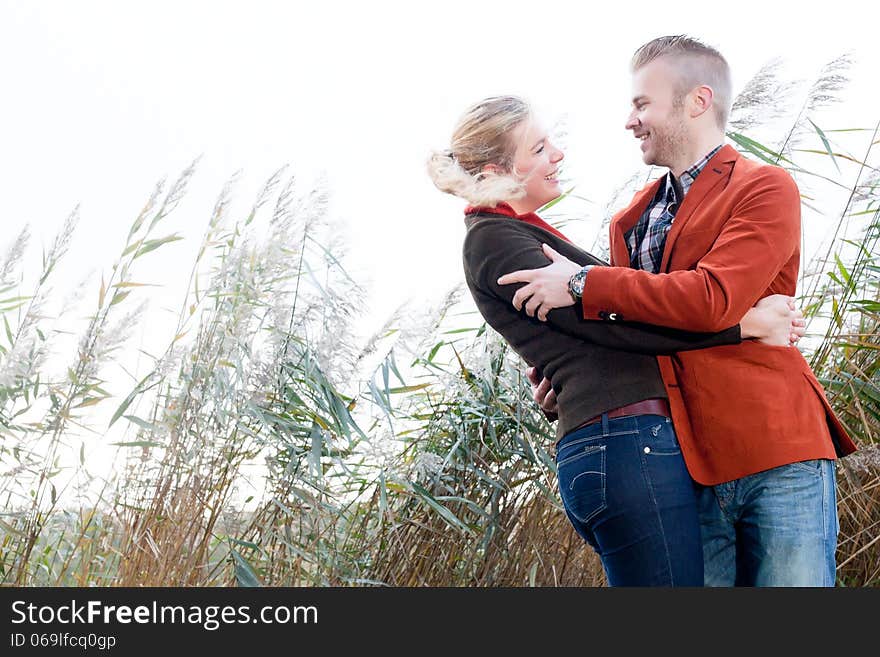 Happy young couple is having a nice time in october. Happy young couple is having a nice time in october