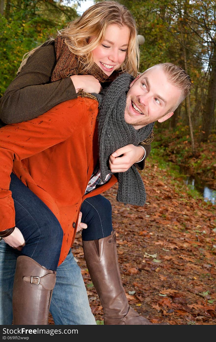 Happy young couple is having a nice time in october. Happy young couple is having a nice time in october