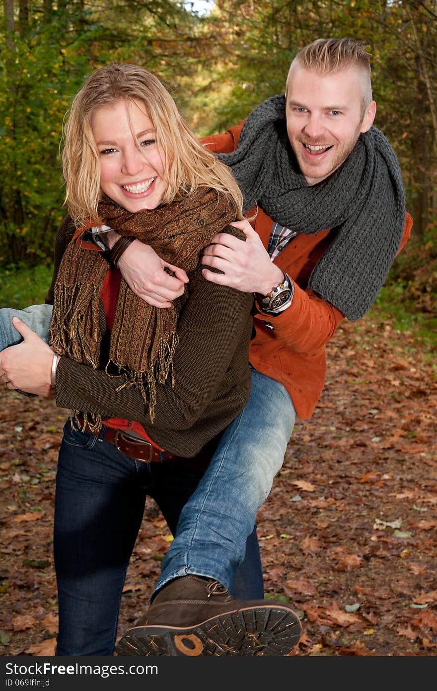 Happy young couple is having a nice time in october. Happy young couple is having a nice time in october