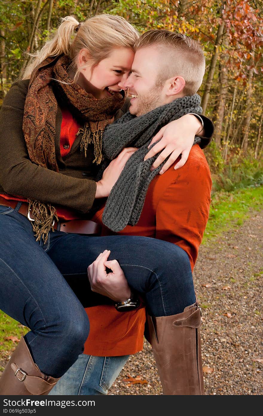 Happy young couple is having a nice time in october. Happy young couple is having a nice time in october