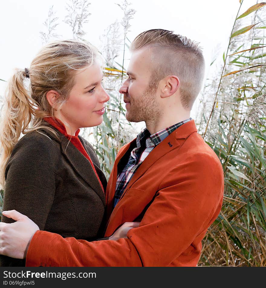 Happy young couple is having a nice time in october. Happy young couple is having a nice time in october