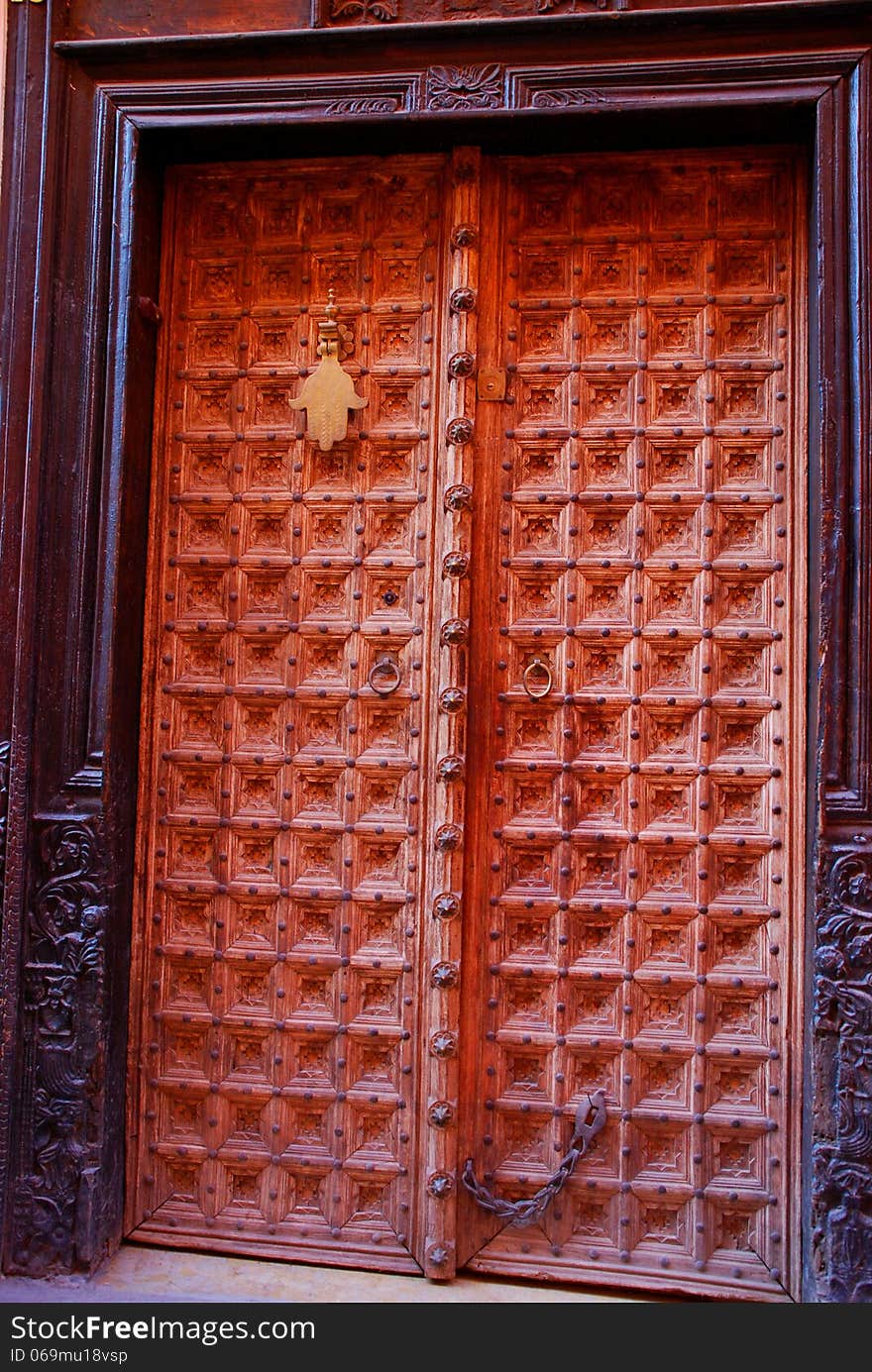 Berber brown moroccan riad door and frame. Marrake