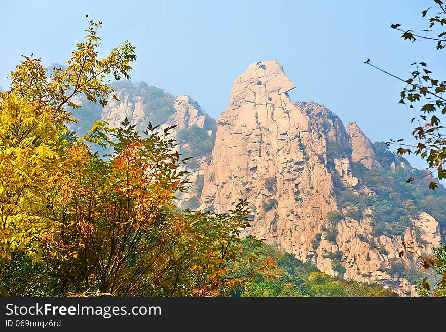 The steep peak and autumnal scenery