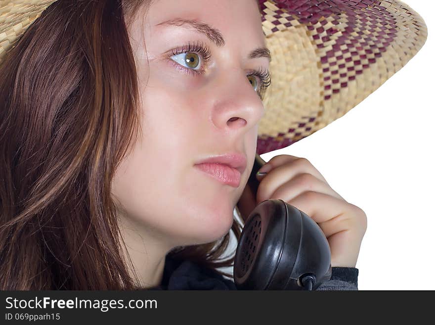 Young woman with a phone, isolated on white