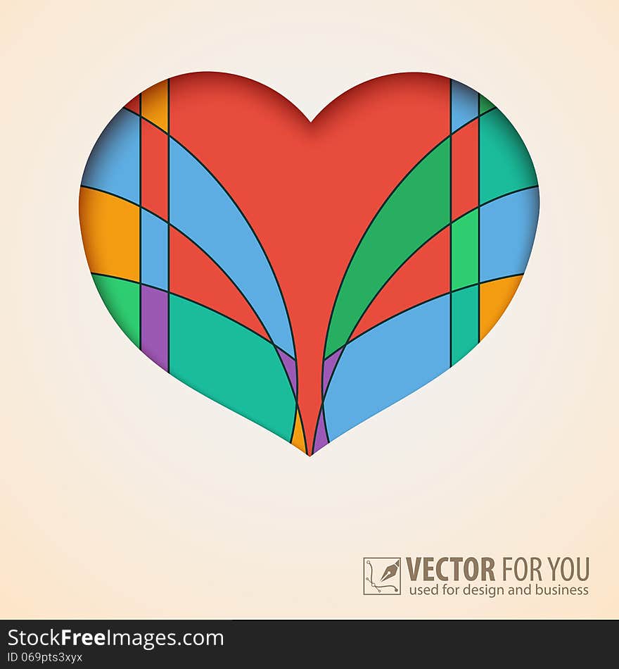 Heart cut out of paper with abstract, colored