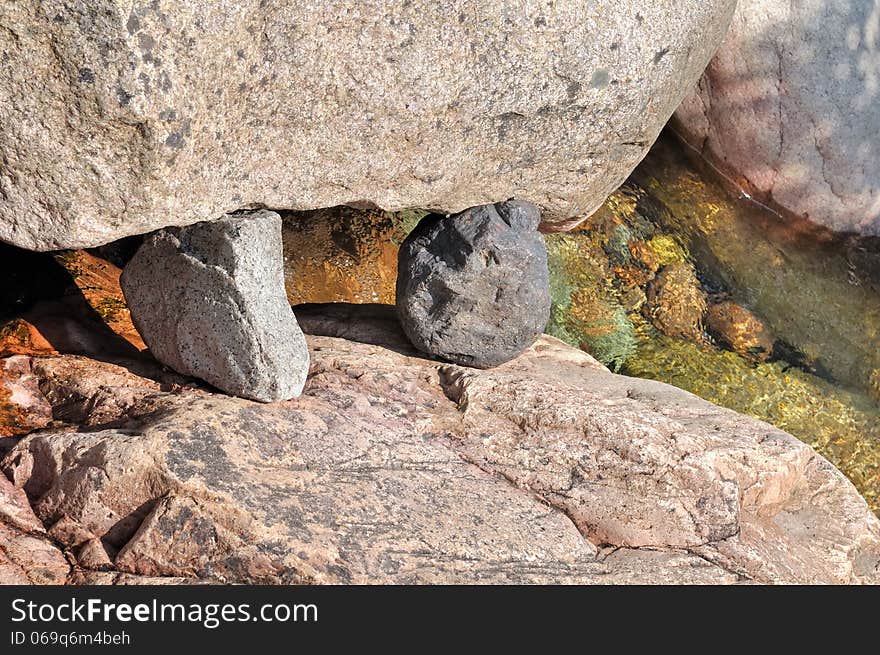 Two stones  wedged