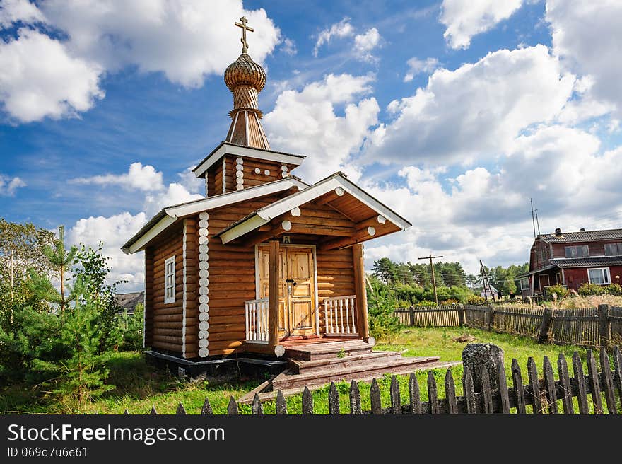 Small wooden Orthodox church in the Kindasovo village, Karelia, north of Russia. Small wooden Orthodox church in the Kindasovo village, Karelia, north of Russia