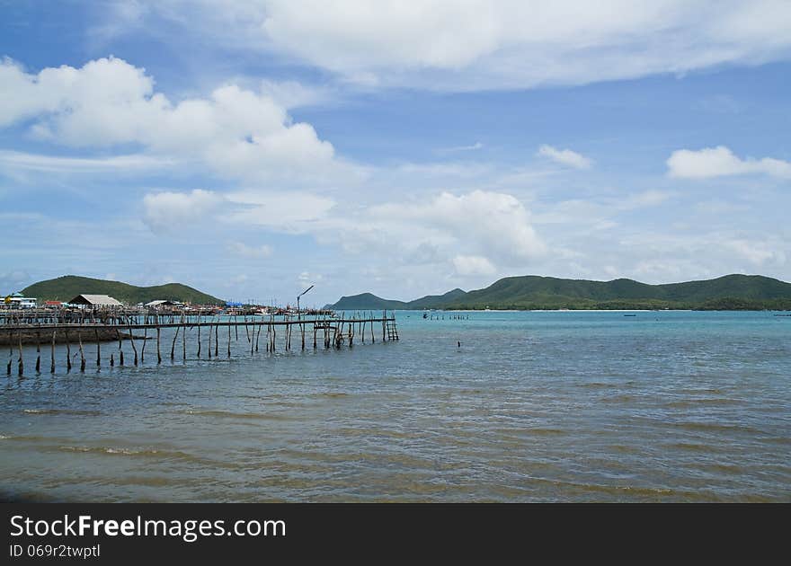 Wooden bridge to the sea,Thailand