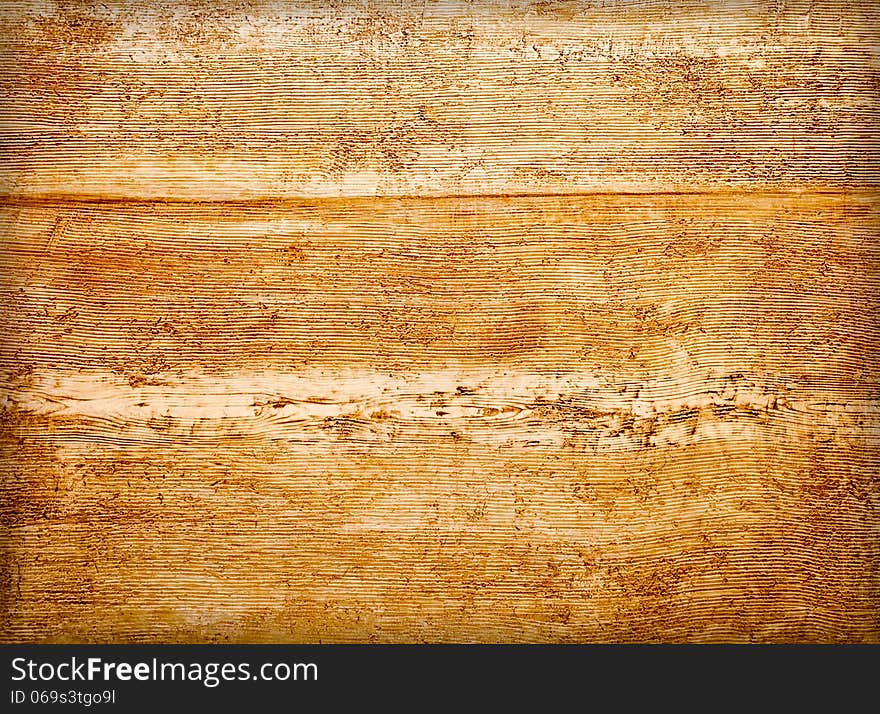 Vintage background from a weathered wooden board. Vintage background from a weathered wooden board