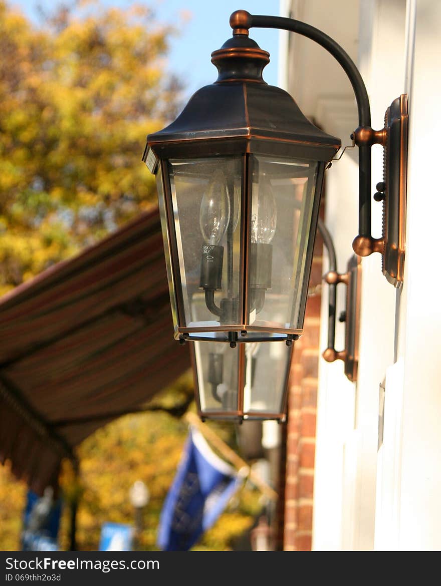 Lamp on the side of a building. Lamp on the side of a building