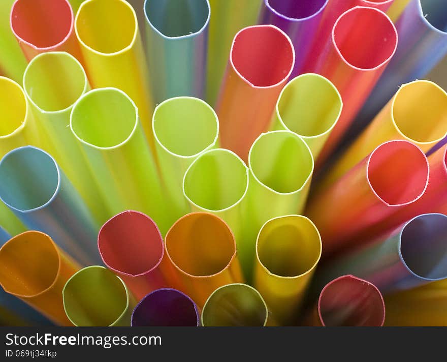 Abstract of colorful straws on a black background