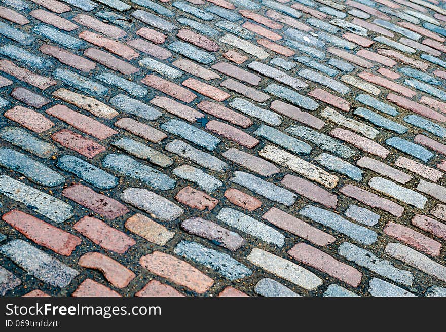 Street Cobbles in Colourful Diagonal Pattern. Street Cobbles in Colourful Diagonal Pattern