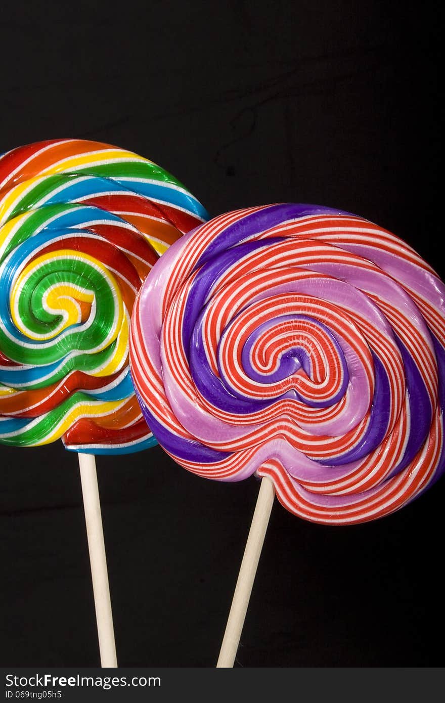 Colorful lollipops on a black background