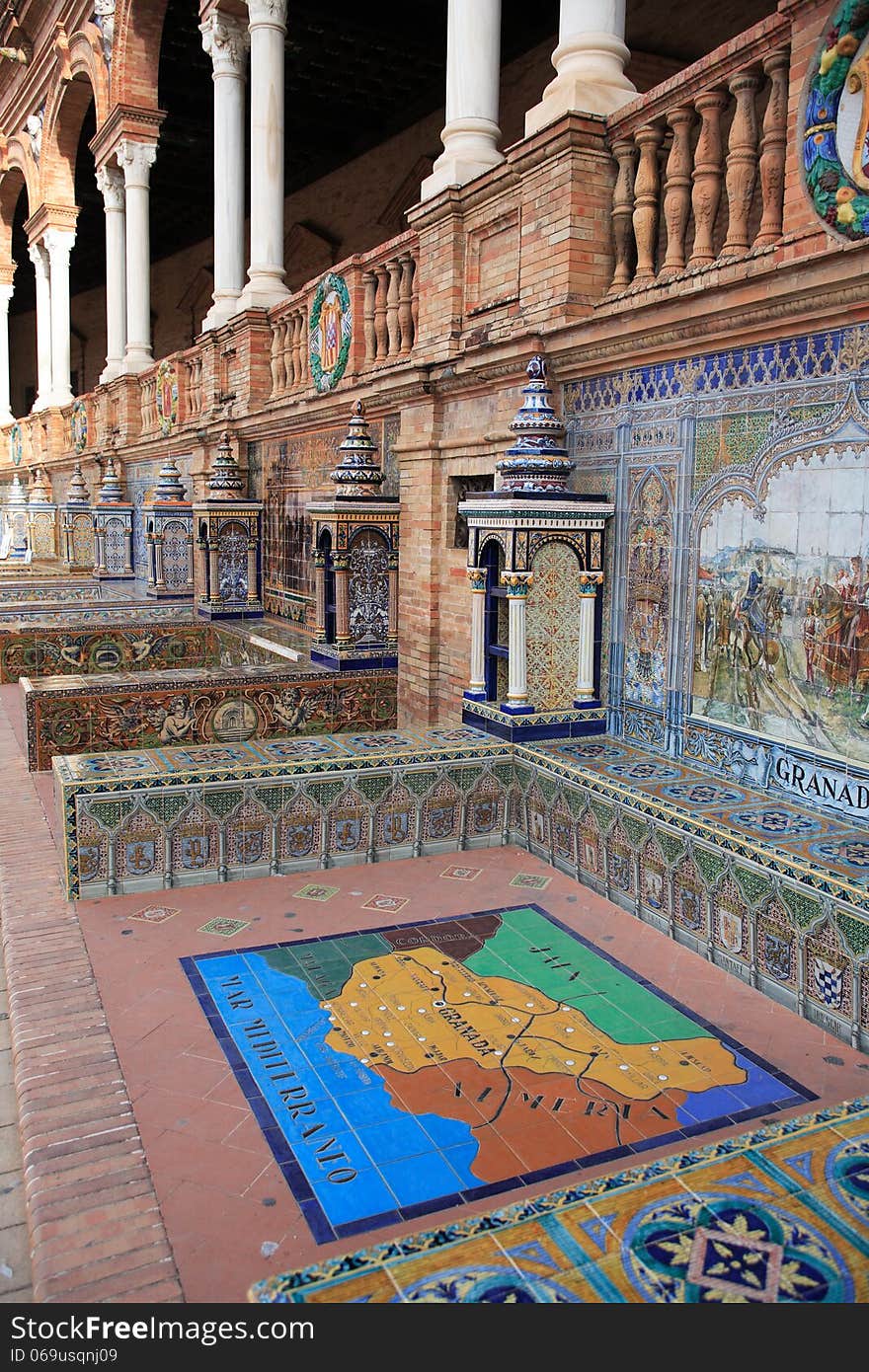 Nice ancient mosaic on palace wall. Spain Square in Sevilla,Spain. Nice ancient mosaic on palace wall. Spain Square in Sevilla,Spain