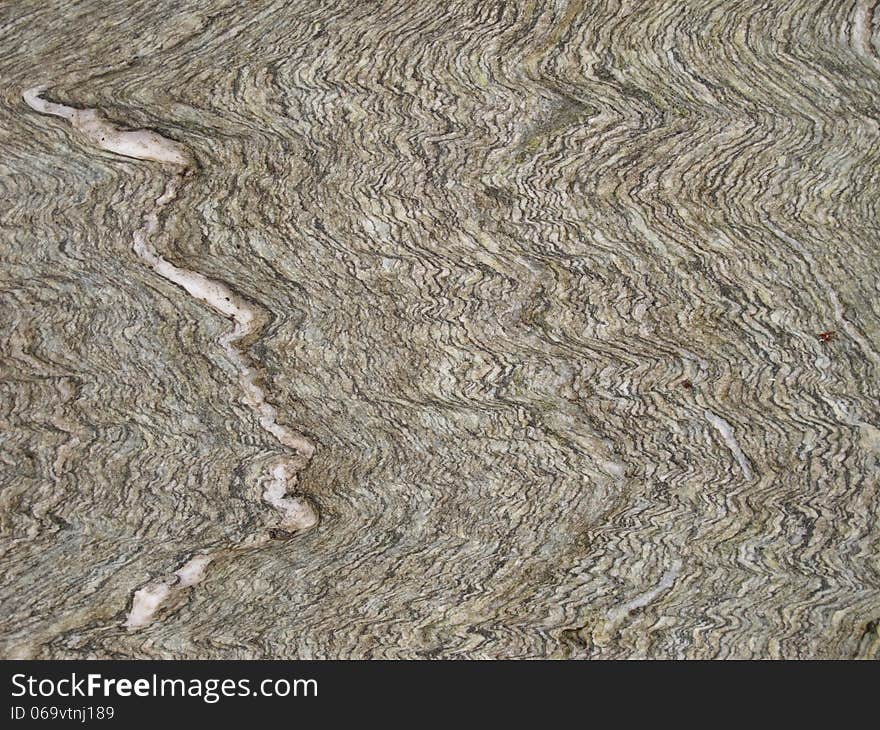 Wavy patterns on a rock. Interesting for background purposes. Wavy patterns on a rock. Interesting for background purposes