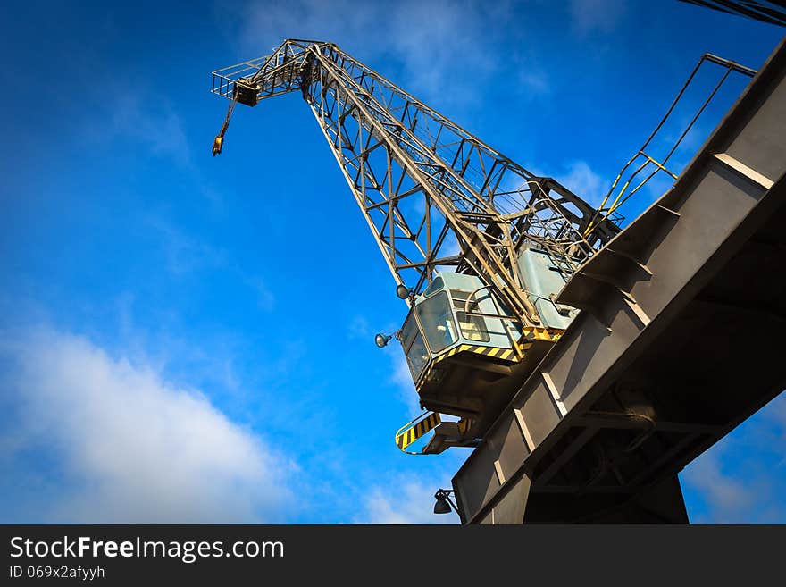 Cargo crane freight train and lumber in port. Cargo crane freight train and lumber in port