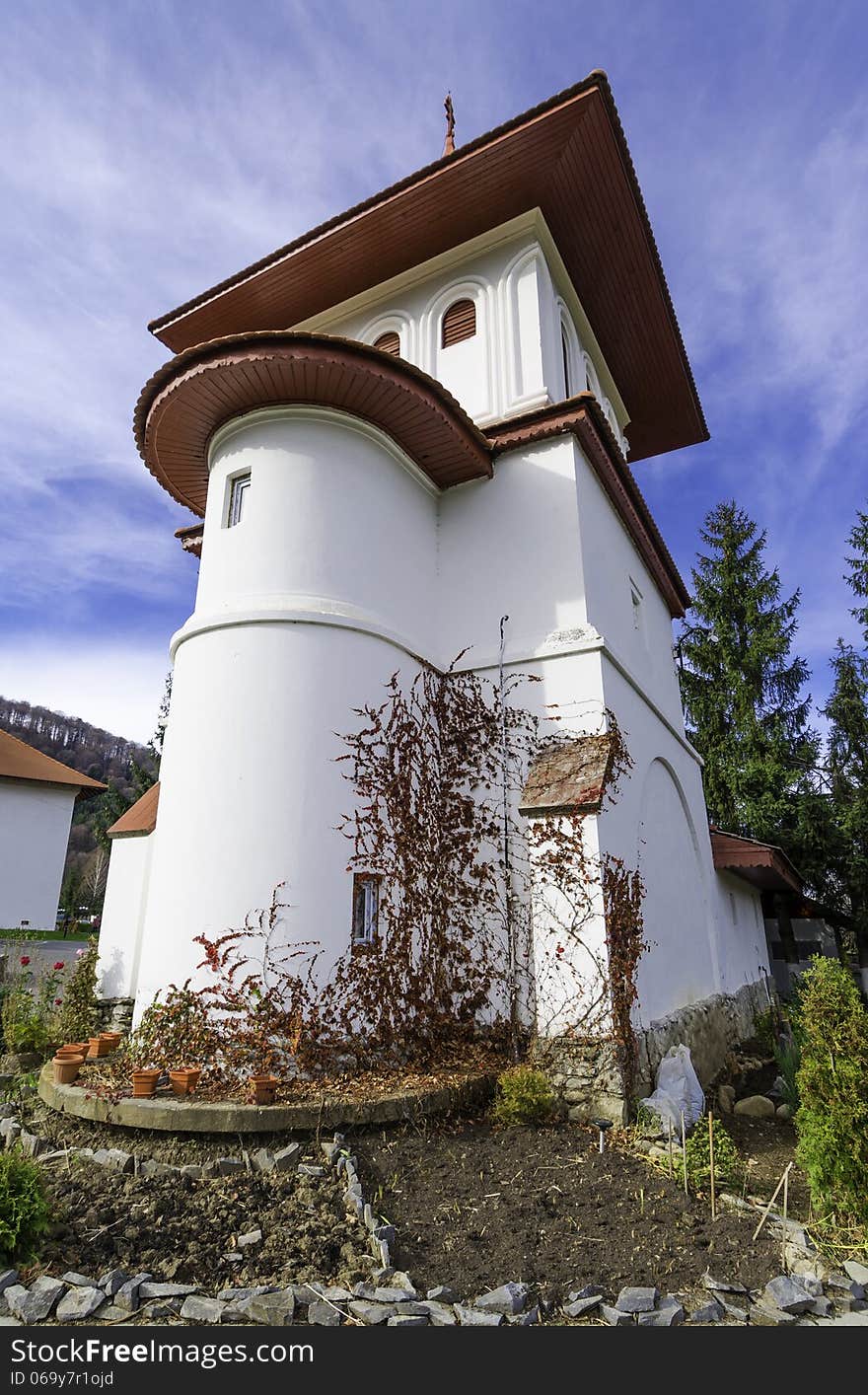 Small church inside Sambata de Sus Monastery resort - in the heart of Carpathian chain of mountains - a sunny autumn sunday right after the liturgy. Small church inside Sambata de Sus Monastery resort - in the heart of Carpathian chain of mountains - a sunny autumn sunday right after the liturgy.