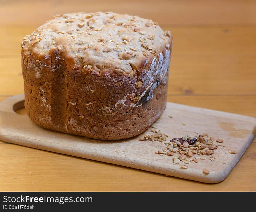 Home made bread with muesli on desk. shallow dof