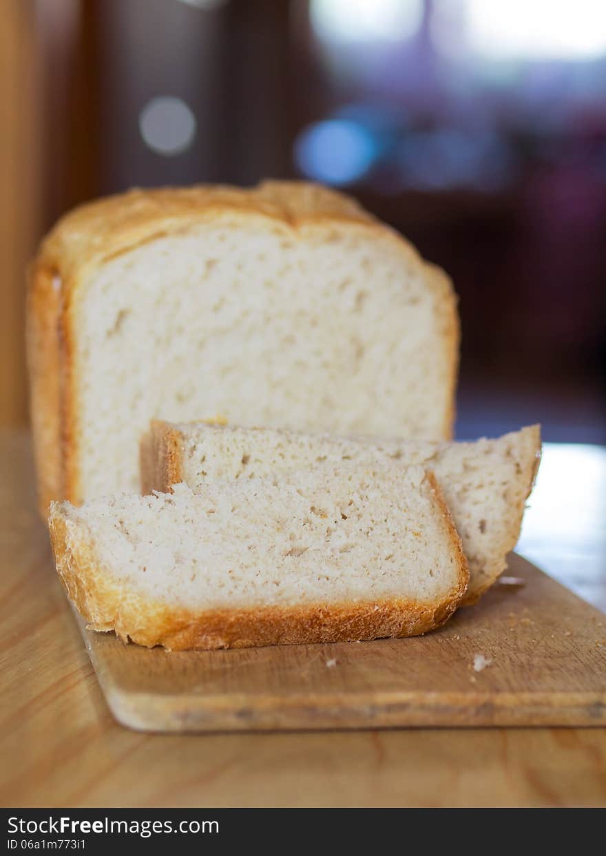 Home made white bread on desk. shallow dof. Home made white bread on desk. shallow dof