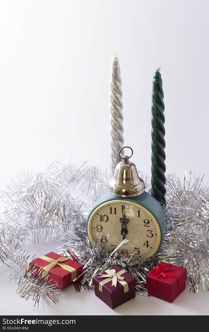 Clock with winter decoration and gifts