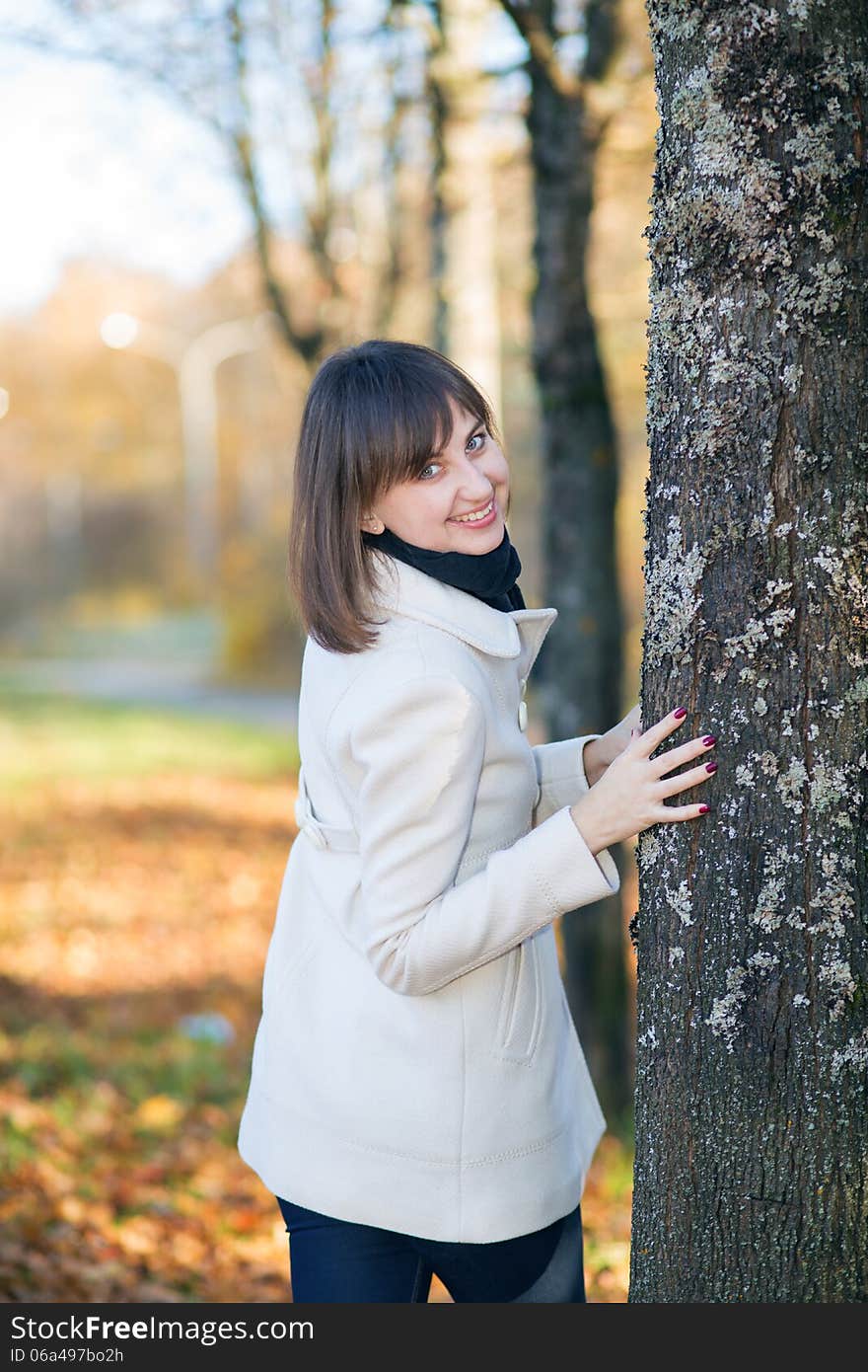 Beautiful girl in autumn Park