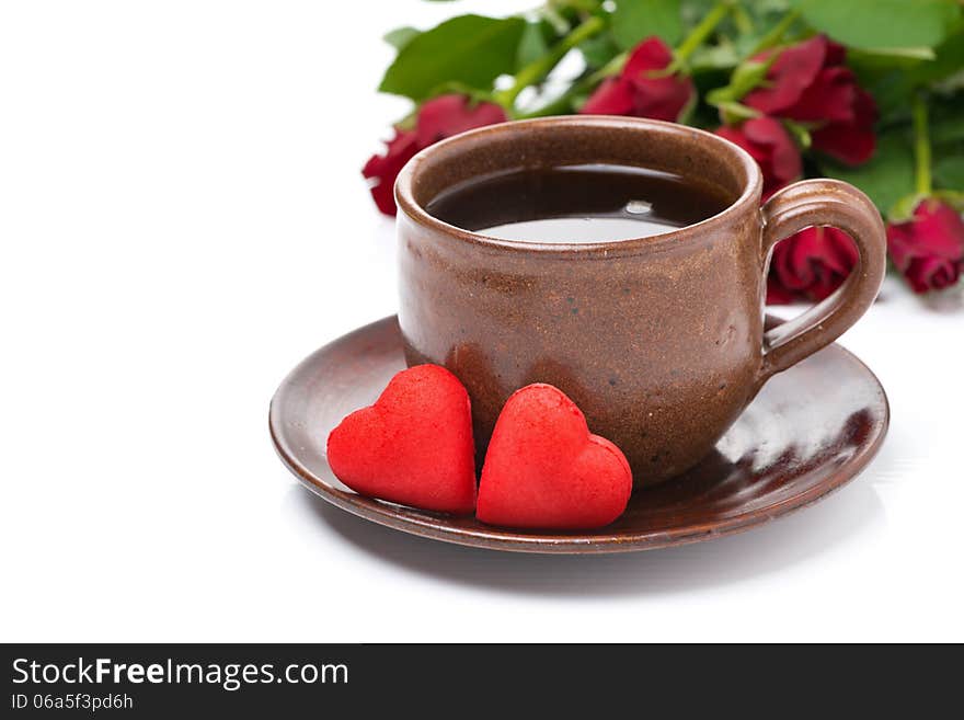 Cup of coffee, red candy, gift and roses for Valentine's Day, isolated on white. Cup of coffee, red candy, gift and roses for Valentine's Day, isolated on white