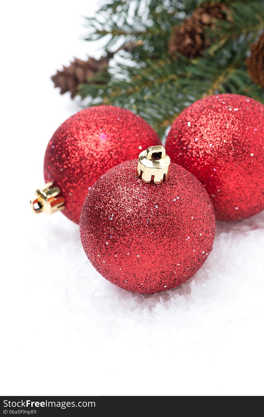 Composition with red shiny christmas balls, isolated on white