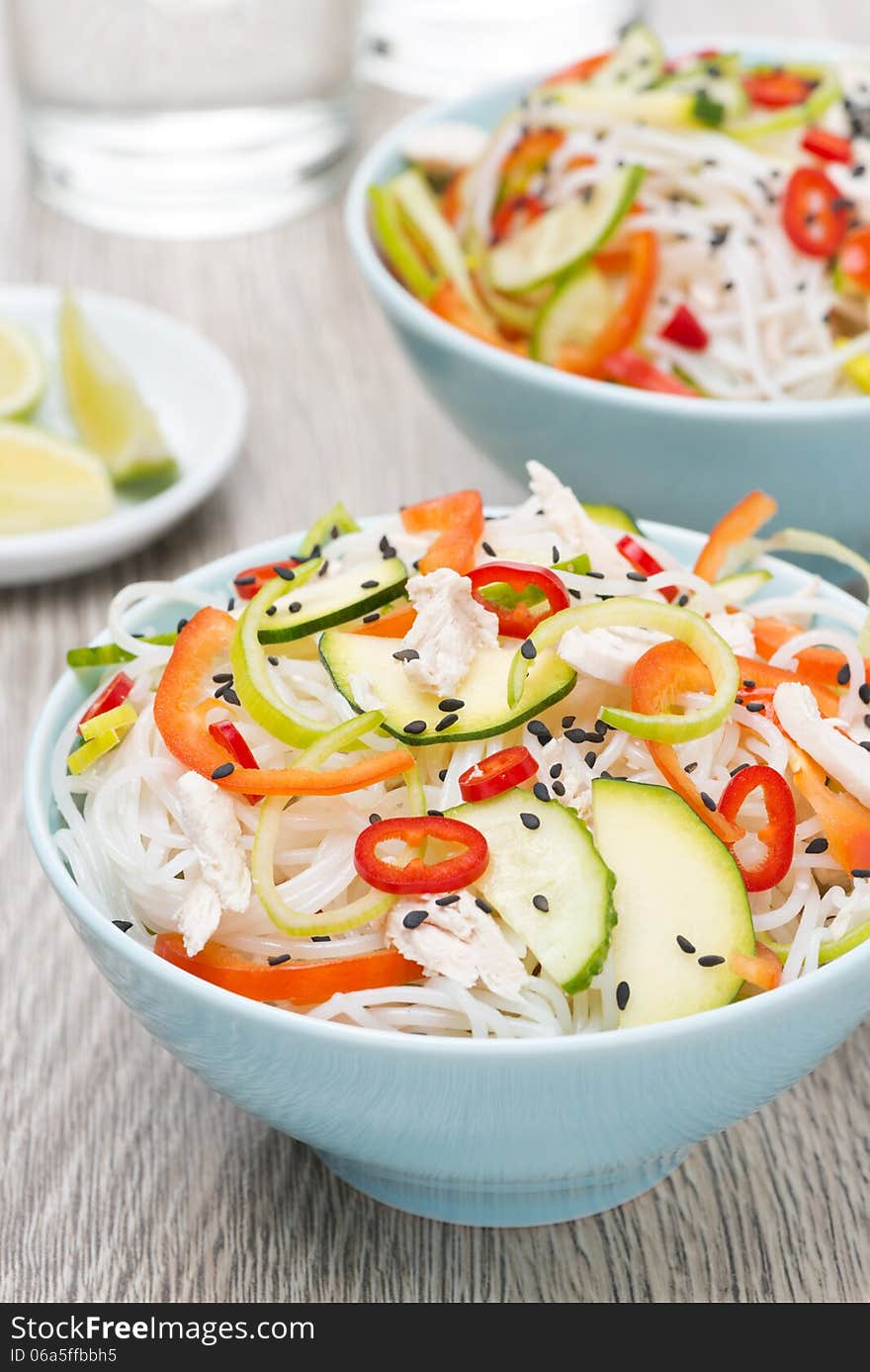 Delicious Thai salad with vegetables, noodles and chicken