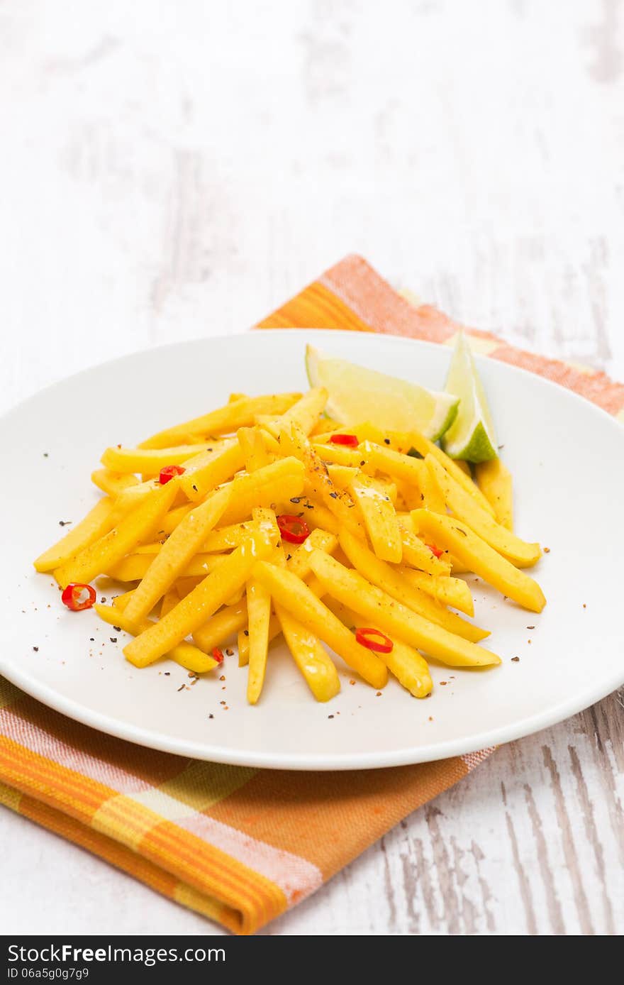 Roasted pumpkin with lime and chilli on the plate