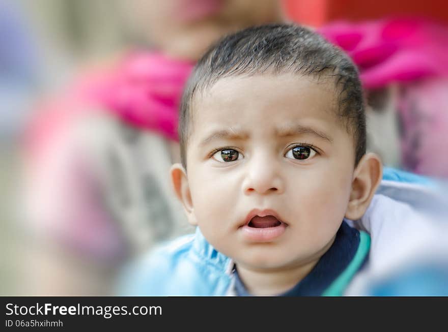 Portrait of cute baby boy looking at camera