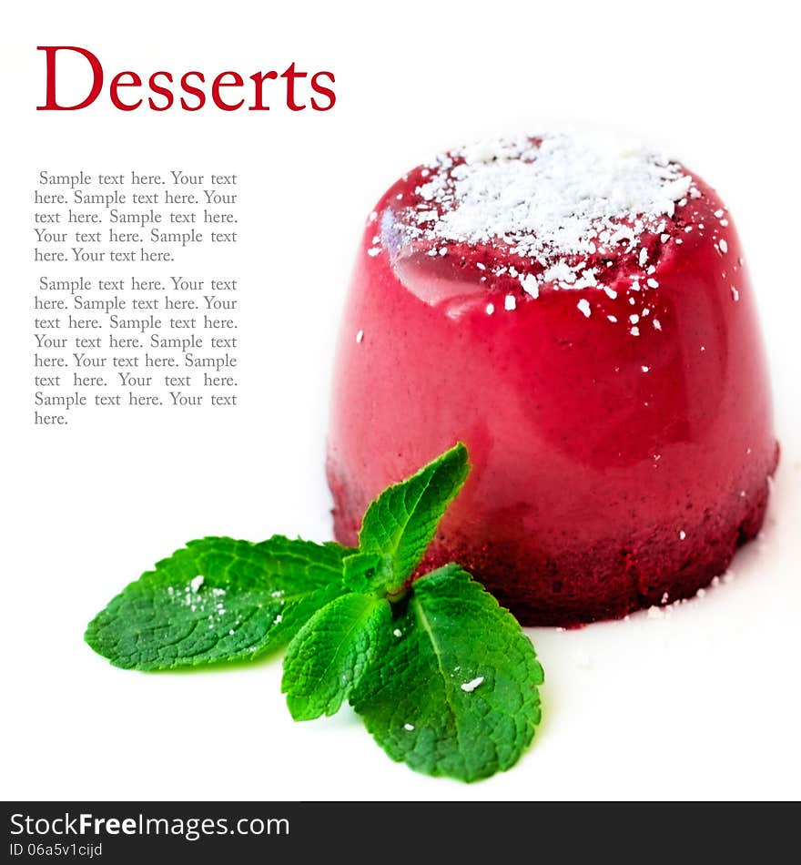 Dessert - cherry pannacotta with mint leaves