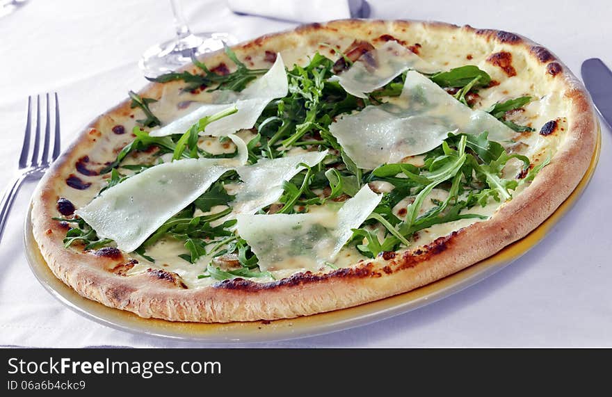 Pizza with mushrooms and parmesan cheese