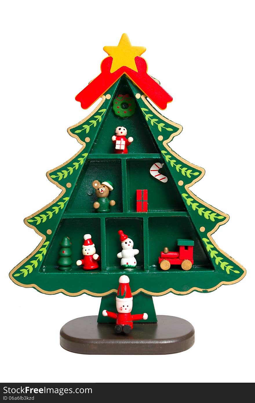 A miniature wooden christmas tree