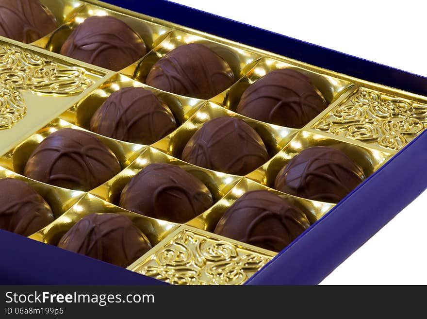 Chocolate Sweets In The Box On The White Background.