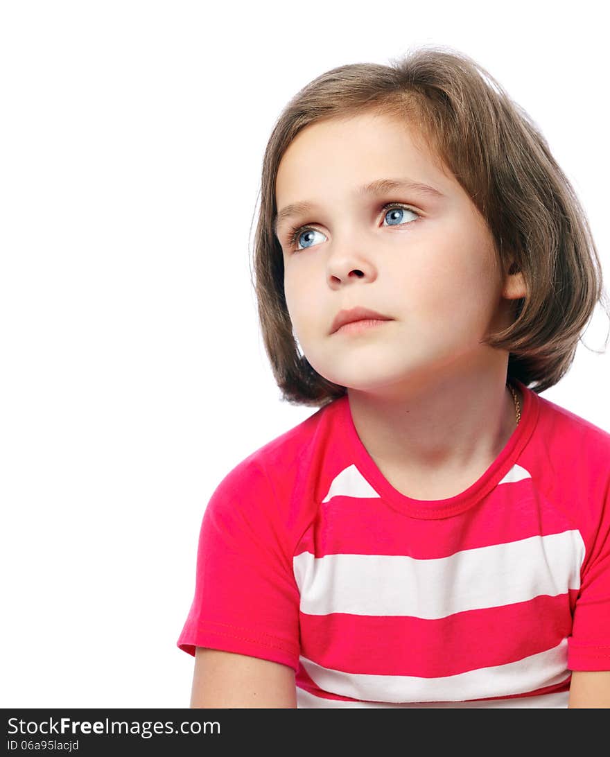 Portrait of a pretty little girl in red shirt on a white backgro