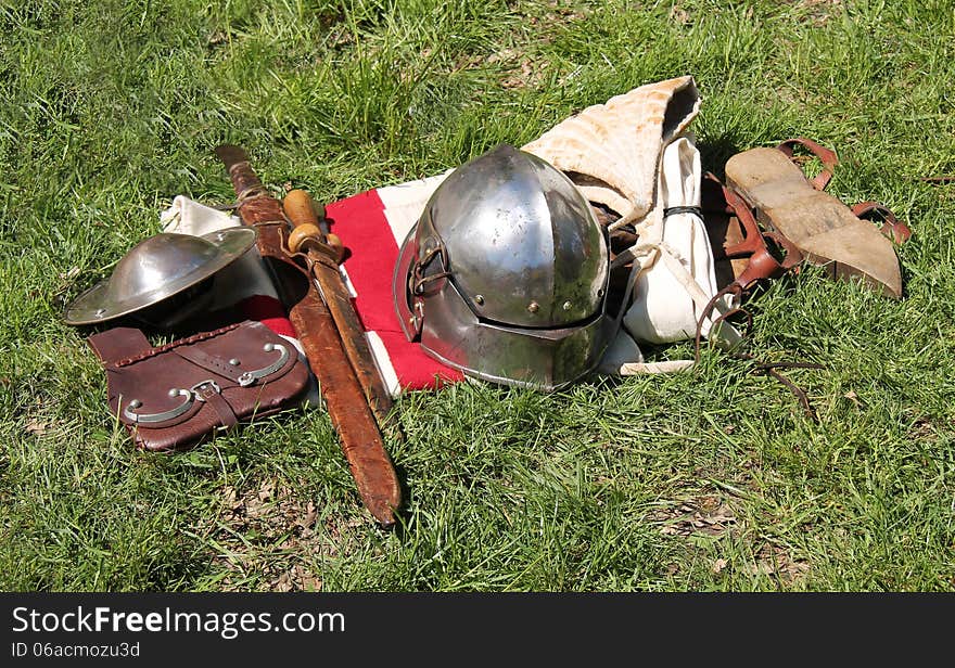 A Medieval Outfit of Armour Clothes and Weapons.