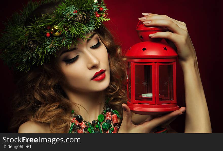 Christmas Woman. Beautiful Christmas wreath. New Year. Christmas Woman. Beautiful Christmas wreath. New Year.