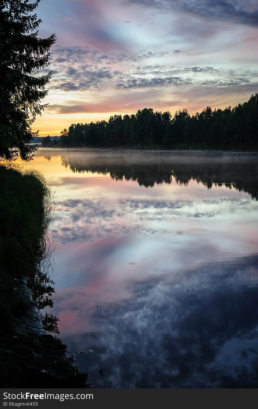 Dramatic sunset over the river in Karelia, the north of Russia. Dramatic sunset over the river in Karelia, the north of Russia