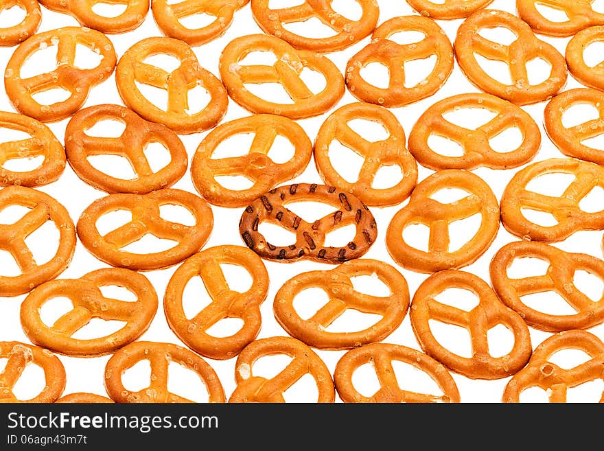 Pretzels isolated on a white background, all in focus, (wide DOF), with one pretzel up side down