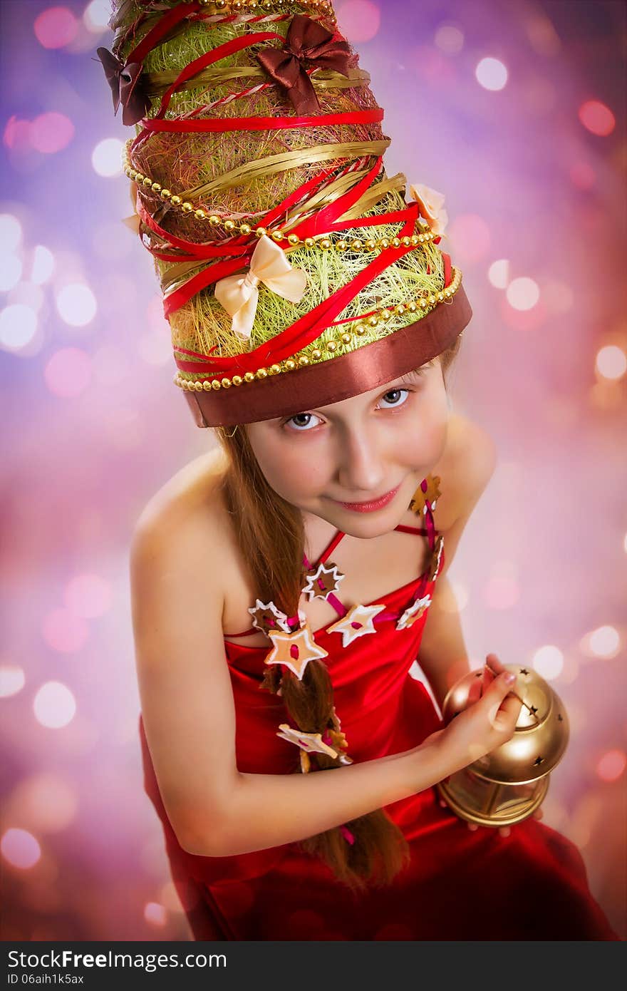 The Christmas girl in a carnival red dress