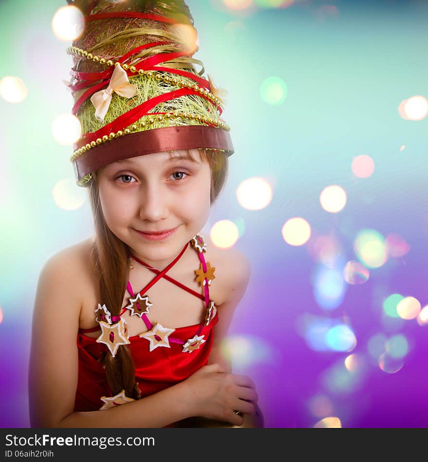 The Christmas girl in a carnival red dress