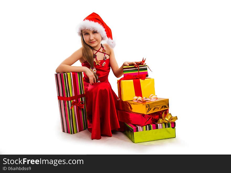 Christmas gifts and small girl Santa. Christmas gifts and small girl Santa